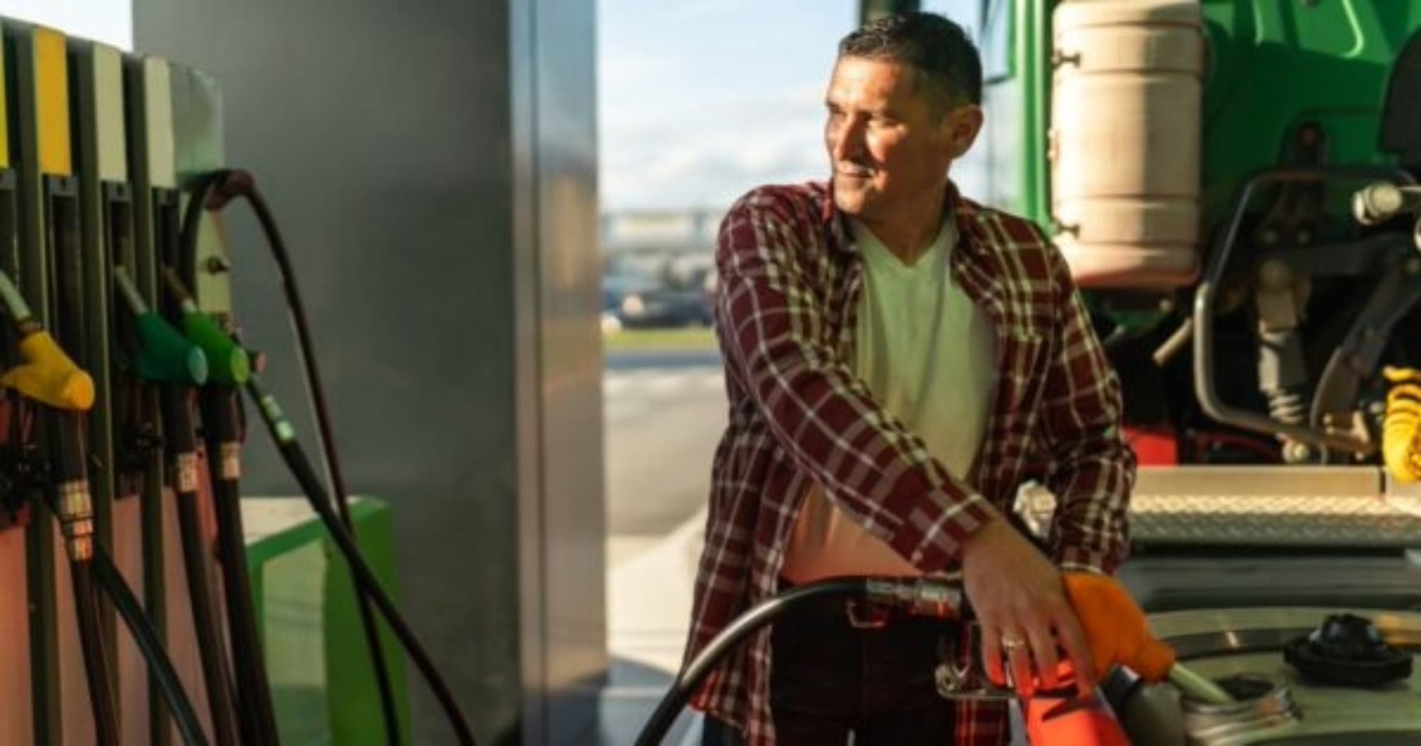 man fueling up his truck