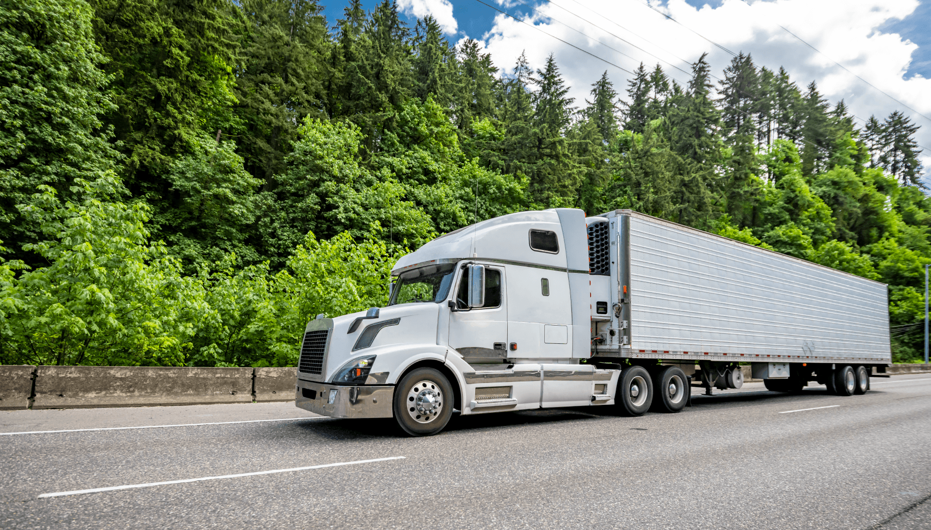 Gray semi truck on highway